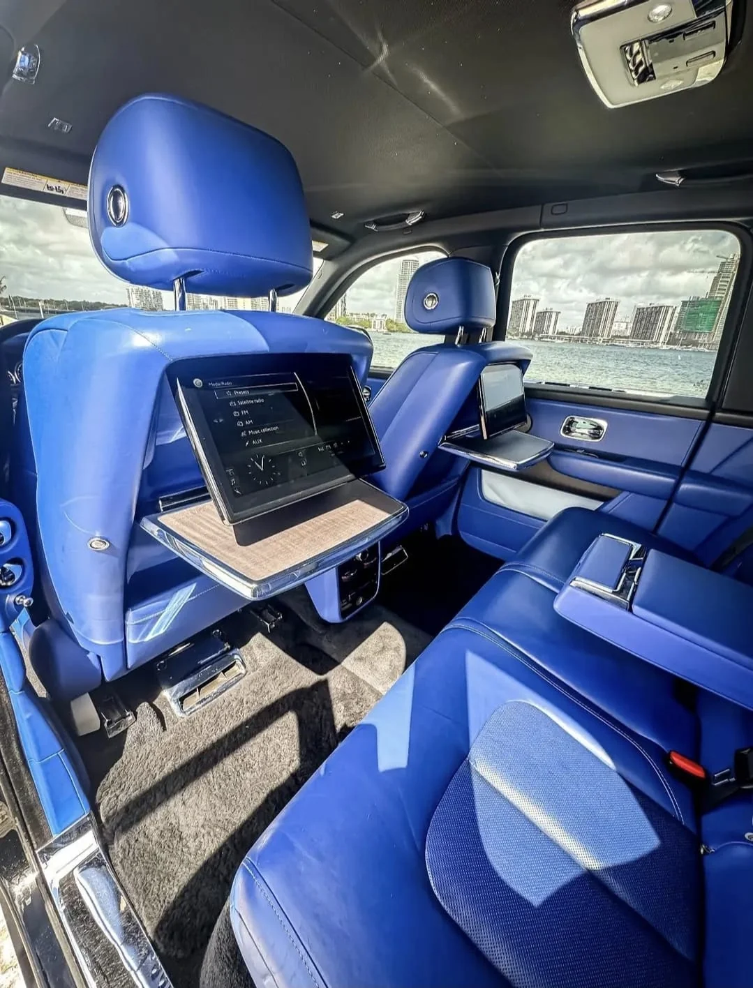 Blue leather Rolls-Royce rear cabin