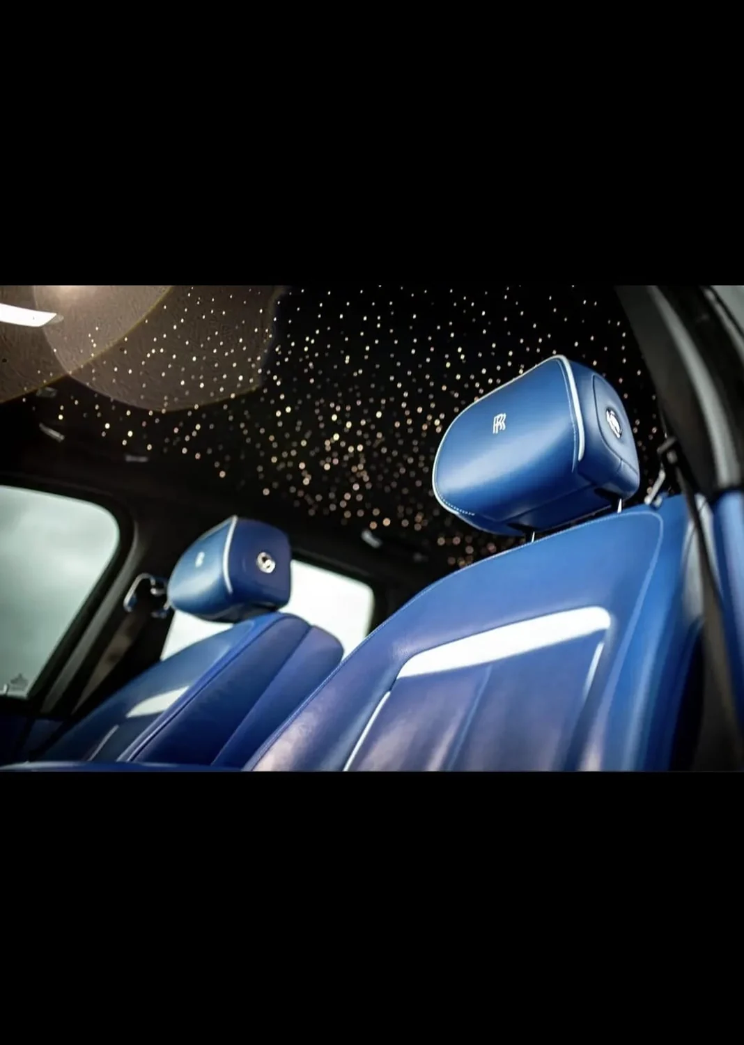 Rolls-Royce starlight headliner and blue leather seats